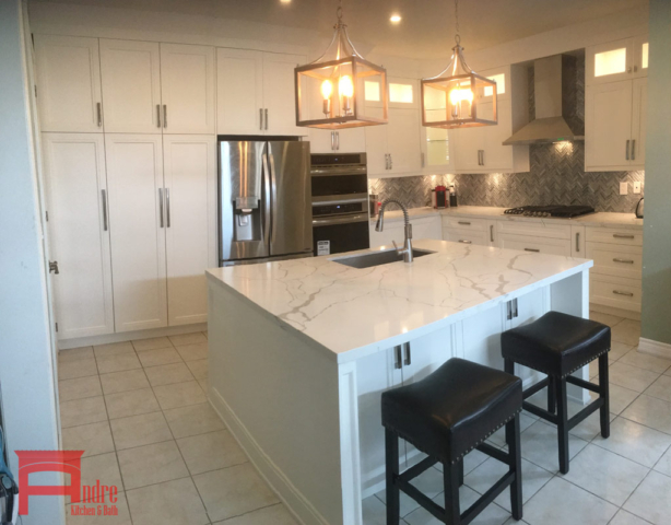 Transitional Kitchen With Painted Mdf, Profiled Doors, Quartz Countertop, And Island